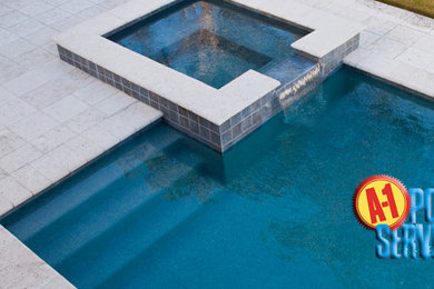 Example of a beach style pool design in Atlanta