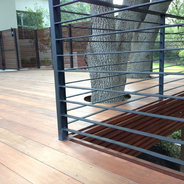 Modern ipe deck, railing and screen around existing pool
