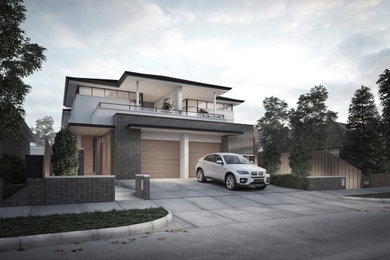Design ideas for a contemporary two-storey brick duplex exterior in Sydney.