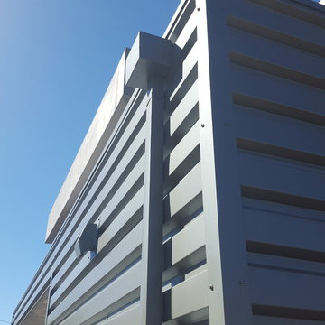 24 Gauge Steel, Collector Box and Downspout on Matching Wall Panels.