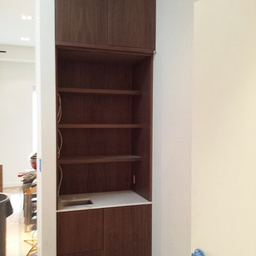 Custom walnut stairs & wet bar Soho- New York, NY
