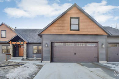 Inspiration for a rustic house exterior in Grand Rapids.