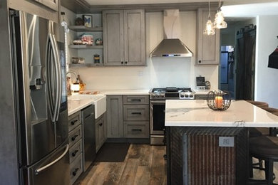 Kitchen - industrial kitchen idea in Orange County