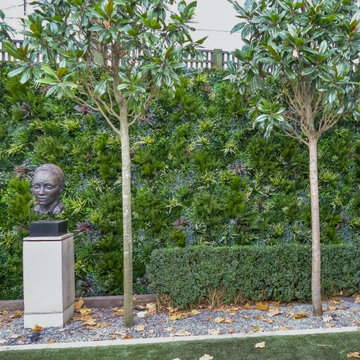 Amazing Sculpture gets Highlighted with Artificial Foliage