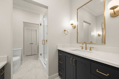 Inspiration for a small 1950s kids' white tile and porcelain tile porcelain tile, white floor and double-sink bathroom remodel in New Orleans with shaker cabinets, blue cabinets, a two-piece toilet, white walls, an undermount sink, quartz countertops, a hinged shower door, white countertops and a built-in vanity