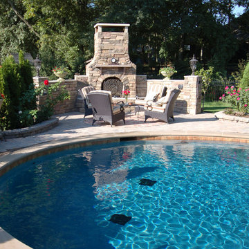 organic shaped pool - with fireplace