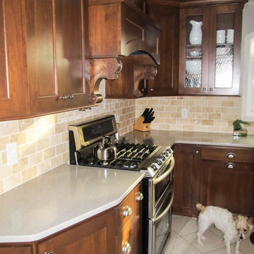 Select Alder Kitchen with Geneva Quartz Countertops.