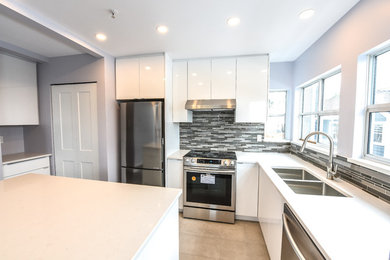 Kitchen - small modern kitchen idea in Vancouver