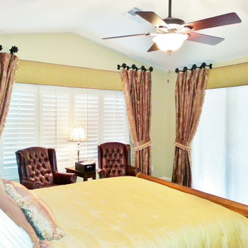 Bedroom complete with Conforter,pillows ,Draperies over cornice boxes.