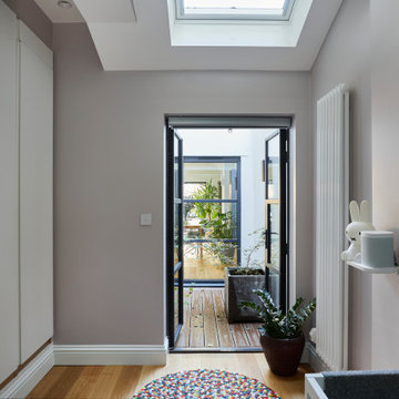Large Wrap-around Rear and Side Extension to a Garden Flat in South West London