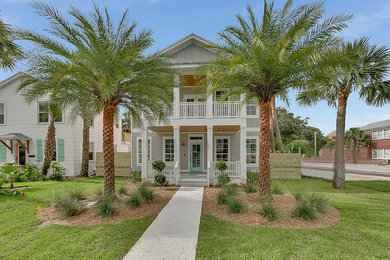 Island style home design photo in Jacksonville