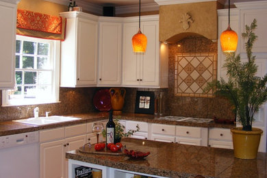 Eat-in kitchen - mid-sized traditional l-shaped medium tone wood floor eat-in kitchen idea in Other with raised-panel cabinets, white cabinets, granite countertops, white appliances and an island