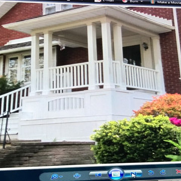 Traditional enhancement stair,porch,railing ,terraced planter surround.