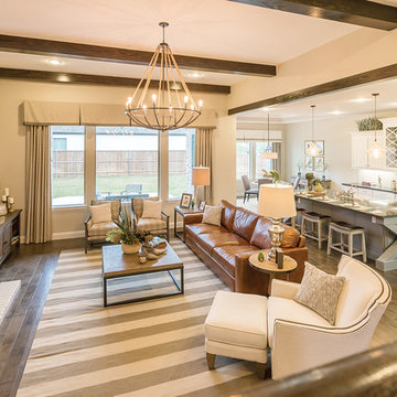 Large picture windows offer exterior views to the backyard