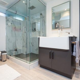 Large contemporary utility room in Toronto with grey walls, vinyl flooring and grey floors.