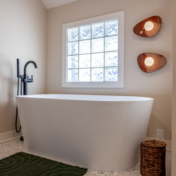 Primary & Guest Bathroom Remodel with Improved Layout and Heated Terrazzo Floors