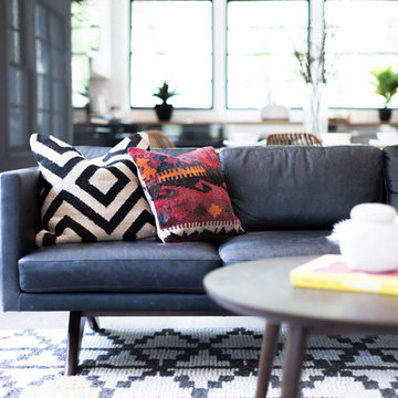 Kilim Pillow Mix on Licorice Leather Sofa with Sheepskin