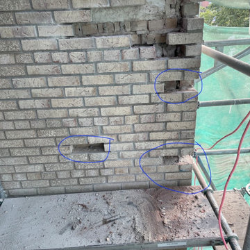 Brick apartment building repair