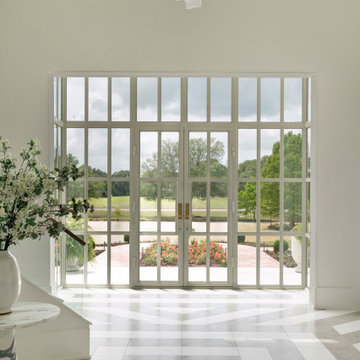 Geometric Grand Foyer: Britannia Limestone & Snow White Marble