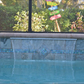 Pavers & Coping With Custom Raised Area With 3 Ft Sheer Descent
