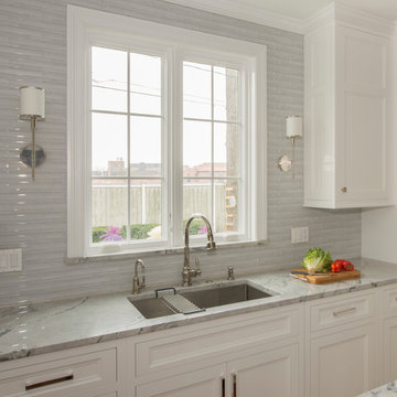 Wall Sconce and Window over Sink