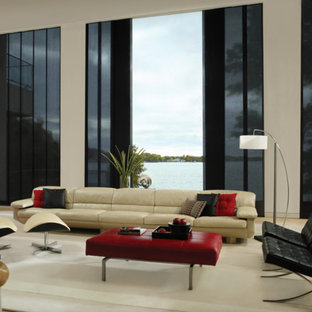 Foto på ett stort funkis separat vardagsrum, med ett finrum, beige väggar, travertin golv och beiget golv