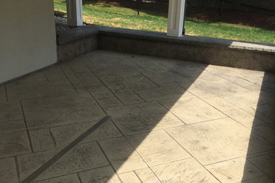 Patio - rustic backyard concrete patio idea in Toronto