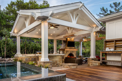 a Loggia with an Outdoor Kitchen and Living Room