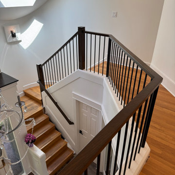 Wood newels and metal newel posts combination