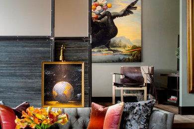 Living room - industrial loft-style light wood floor and wallpaper living room idea in Denver