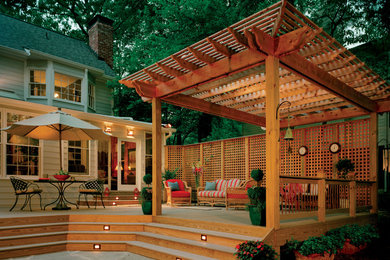 Inspiration for a backyard deck in Atlanta with a pergola.