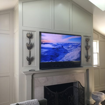 Recessed TV & Custom Soundbar over fireplace