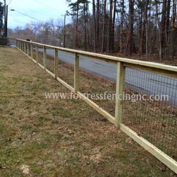 simple post and frame fence with black vinyl coated wire insert - Products