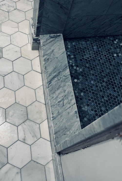 Help! Shower curb doesn’t line up with pony wall.