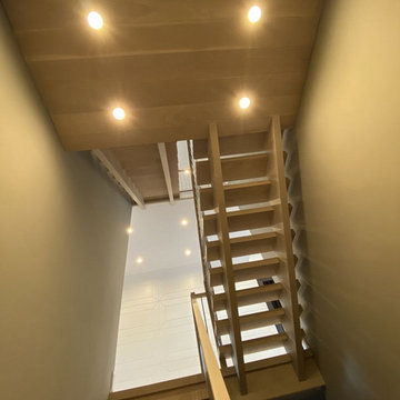 White Oak Stairs with Polished Stainless Steel Balusters