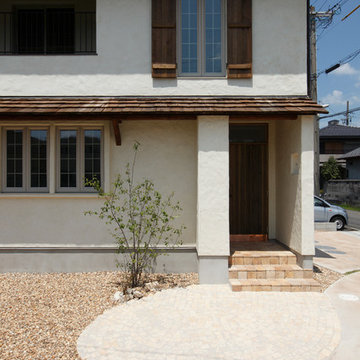 ヴォレのある漆喰外壁