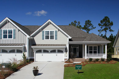 Inspiration for a contemporary gray two-story exterior home remodel in Wilmington