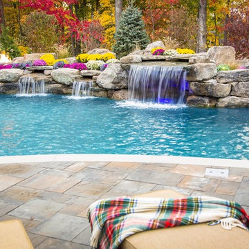 Freeform swimming pool with a raised spa and grotto, Mahwah, NJ