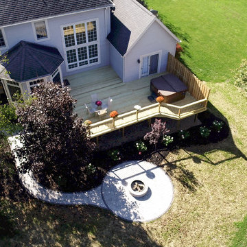 Deck and Unilock Paver Patio with Firepit & Landscaping