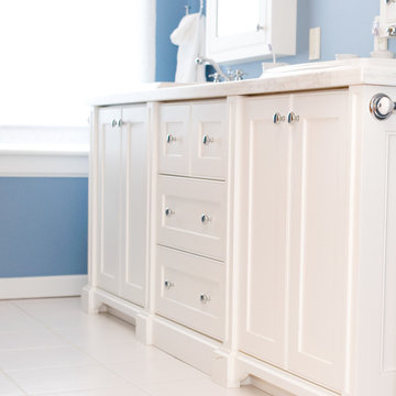 Blue Bathroom with A Double Vanity and Twin Medicine Cabinets