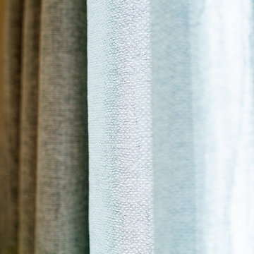 Functional Drapes with 2-Finger Pinch Pleat on a Matte Black Traverse Rod