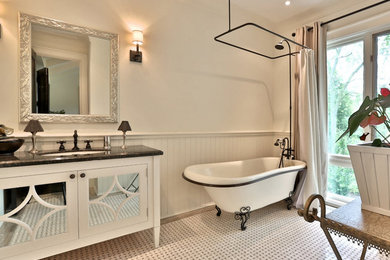 Mid-sized contemporary bathroom in Toronto with an undermount sink, white cabinets, a claw-foot tub, a shower/bathtub combo, white walls, marble floors, multi-coloured floor and recessed-panel cabinets.