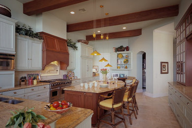 Example of a large classic marble floor eat-in kitchen design in Miami with an undermount sink, beaded inset cabinets, white cabinets, granite countertops, stainless steel appliances and an island