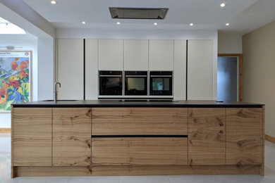 Large contemporary single-wall open plan kitchen in Buckinghamshire with with island.