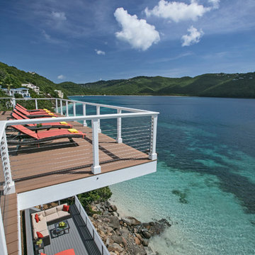 Cantilevered deck with a wire railing overlooking Magens Bay on St. Thomas