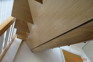 This is an example of a contemporary staircase in Other.