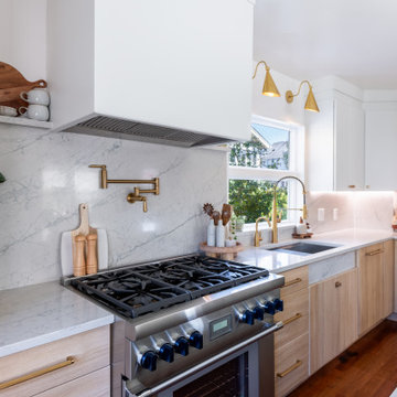 Serene Elegance: Light Wood & Sage Green Kitchen