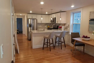 Example of a transitional kitchen design in Boston