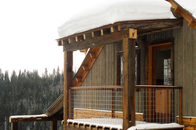 Mountain style home design photo in Denver