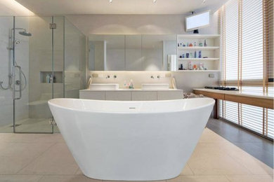 Example of a classic freestanding bathtub design in Other